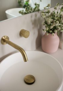 Bathroom renovation interior design, custom designed oak vanity with brass tap ware and lighting designed by ACP Studio Interior Design in Point Piper, Sydney.