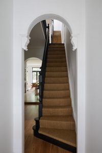 Victorian terrace renovation interior design, black painted staircase with jute stair runner designed by ACP Studio Interior Design in Forest Lodge, Sydney.