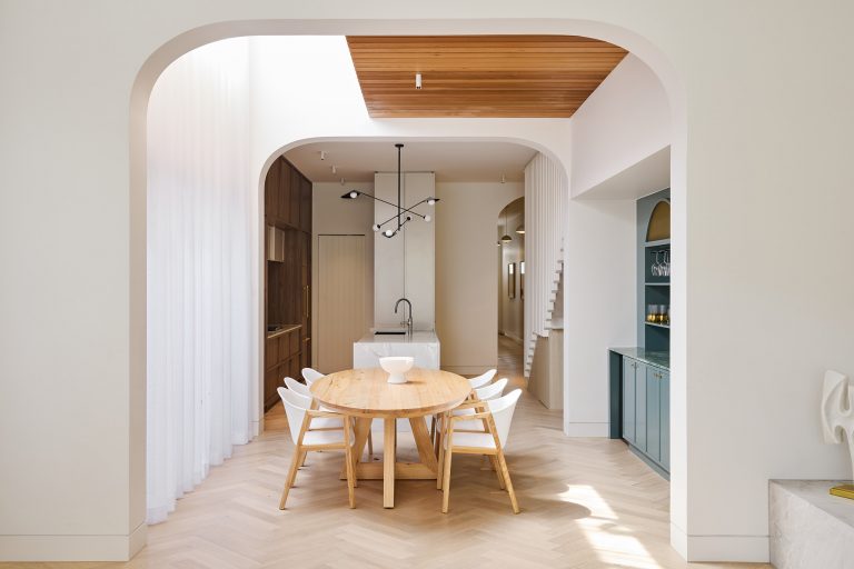 Contemporary home renovation with oak herringbone floor boards, curved thresholds and custom kitchen designed by ACP Studio Interior Design in Coogee, Sydney.