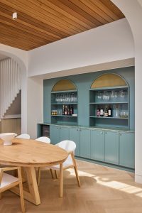 Dining room renovation, custom designed bar joinery with green marble bench top designed by ACP Studio Interior Design in Coogee, Sydney.