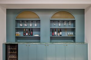 Dining room renovation, custom designed bar joinery with green marble bench top designed by ACP Studio Interior Design in Coogee, Sydney.