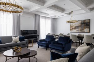 New build living room interior decoration with Arteriors Chandelier and custom furniture designed by ACP Studio Interior Design.