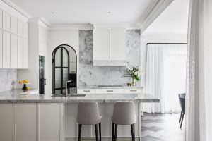 Kitchen renovation with super white marble back splash and fluted glass door designed by ACP Studio Interior Design in Vaucluse, Sydney.